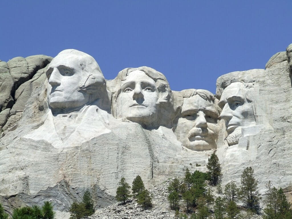 Best things to do in the Black Hills with Kids, featured by top US family travel blog, Travel with a Plan: image of Mount Rushmore, presidents