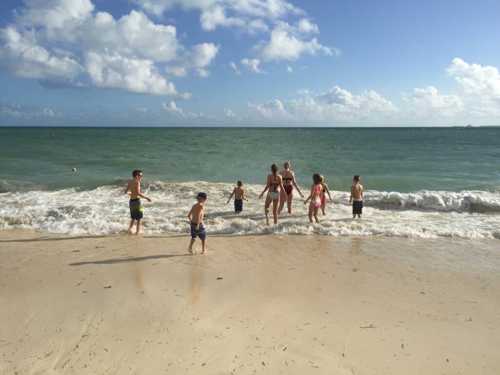 Kids playing on the beach at Dreams Playa Mujeres