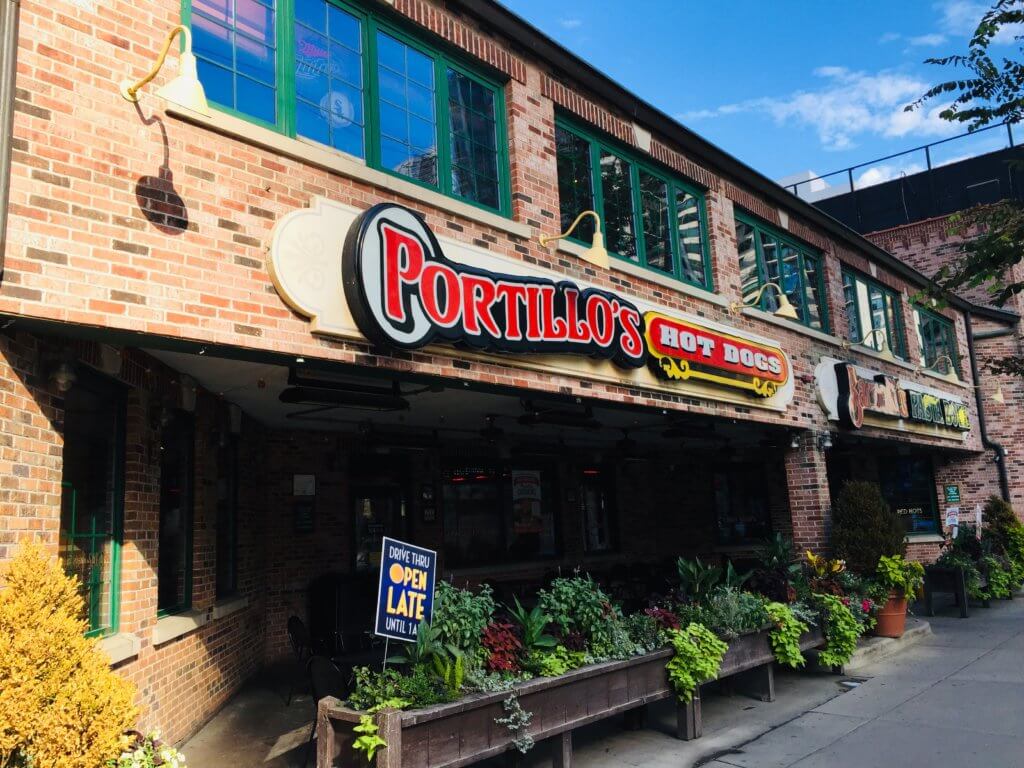 Top 5 Most Kid Friendly Restaurants in Downtown Chicago featured by top US family travel blog, Travel With a Plan: image of Portillo's Hot Dogs