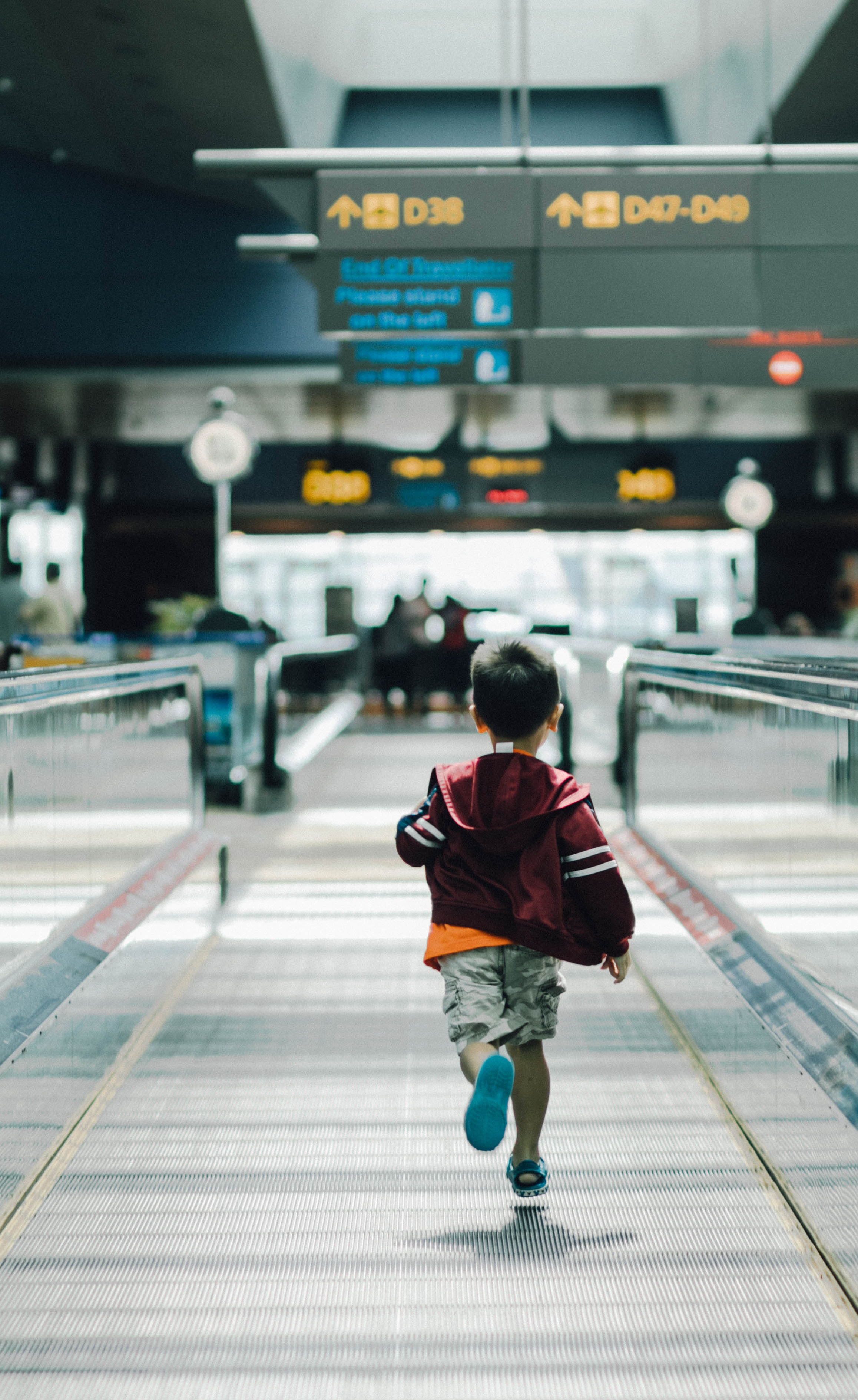 Family Air Travel Changes; boy running through airport