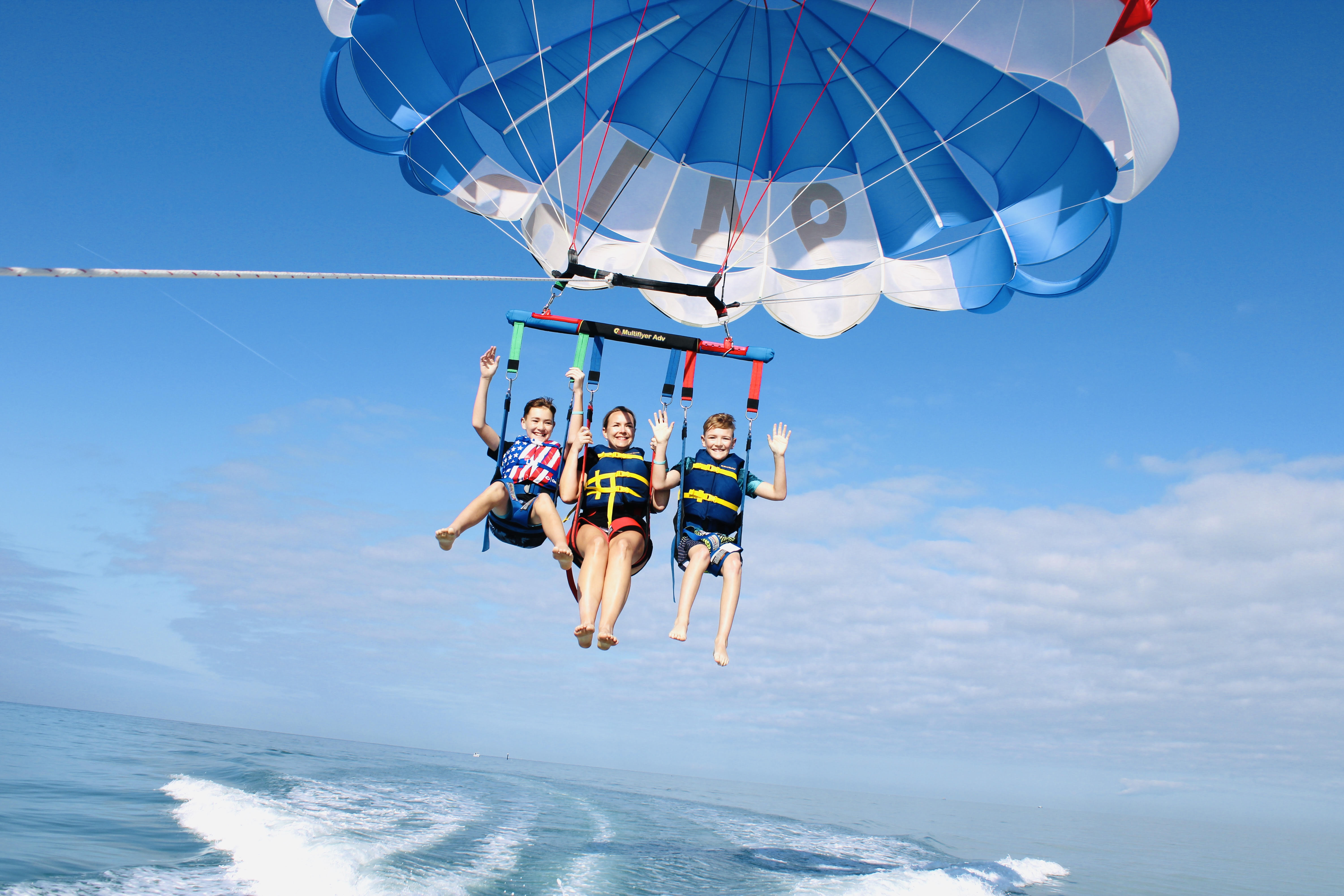 Learn all about Siesta Key parasailing (and find out, "Is Parasailing Scary?") from Top U.S. Family Travel Blog, Travel With A Plan.