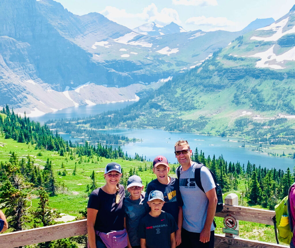 Family photo on Going-to-the-Sun Road in Glacier National Park